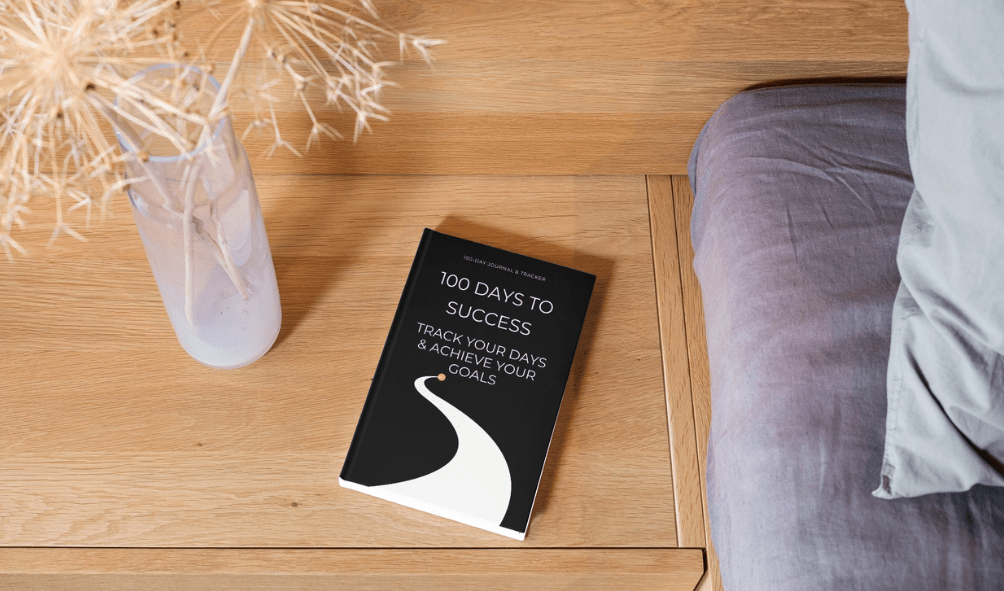 Journal On Table 100 Days to Success Journal – A 100-Day Motivation & Goal-Tracking Planner